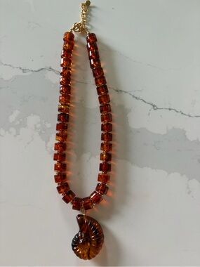 Anthropologie Amber Brown Beaded Necklace with Nautilus Pendant